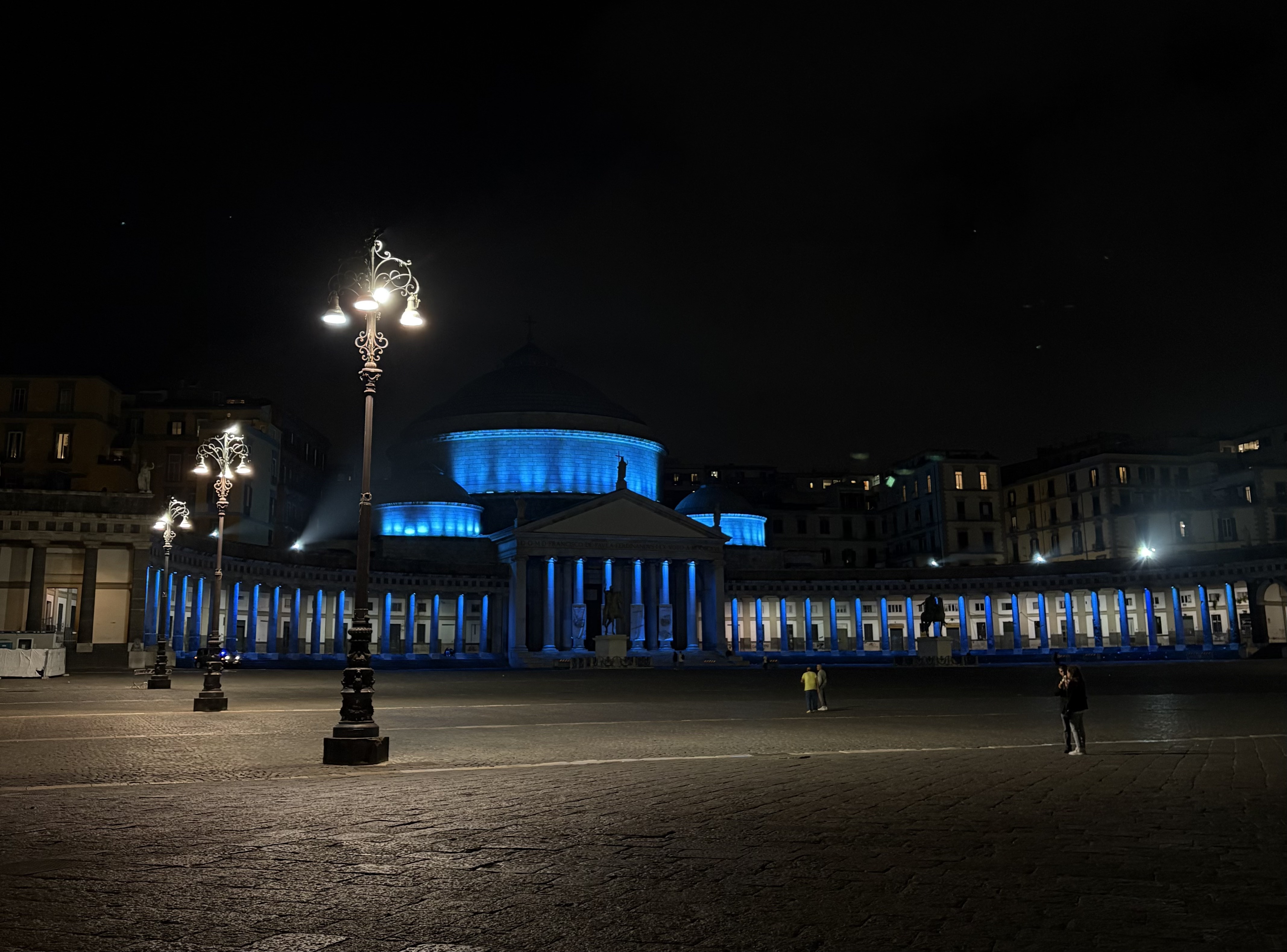 Estatua Ecuestre de Carlos de Borbón lit up in blue