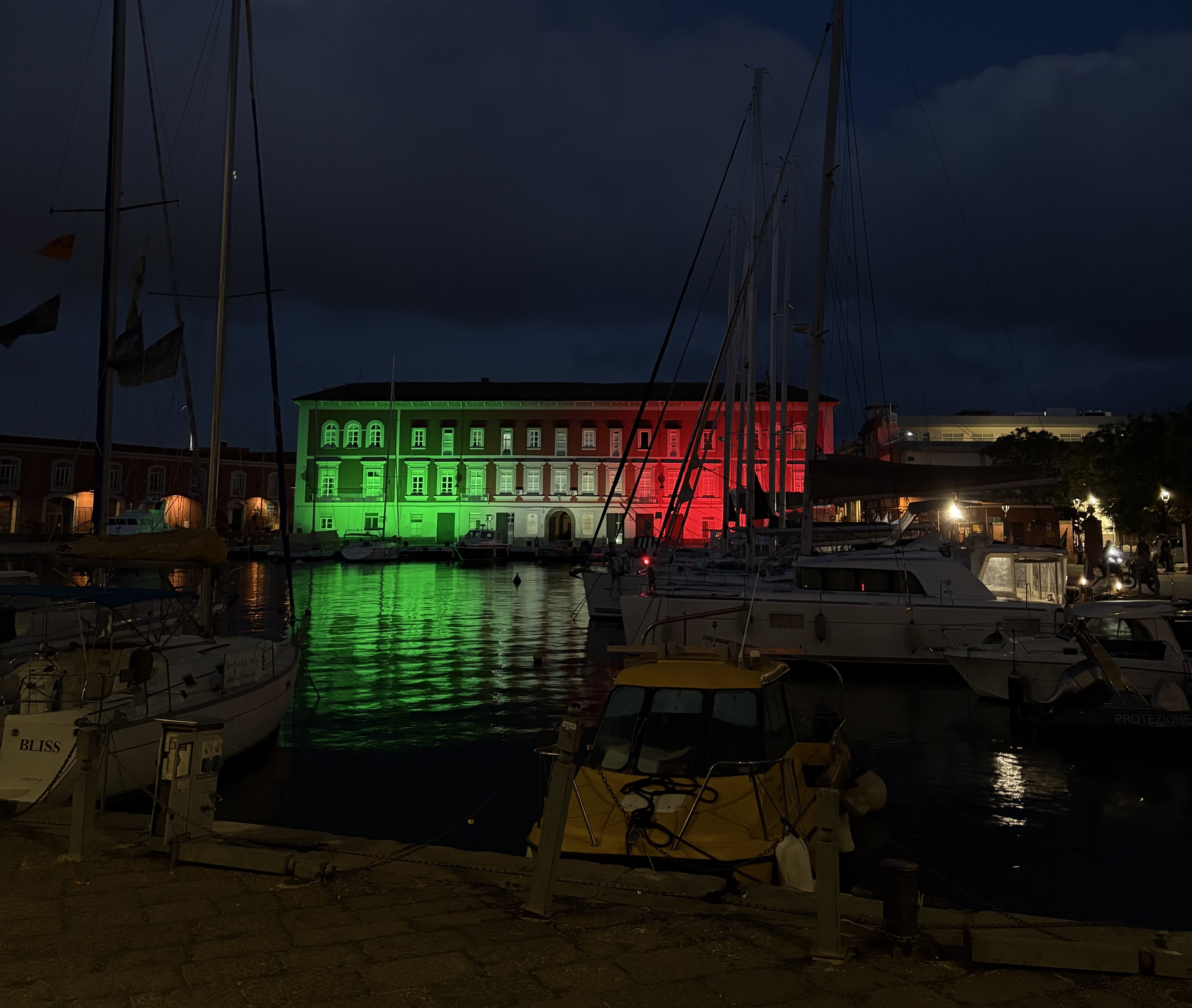 Lega Navale Napoli lit up in the colors of the Italian flag